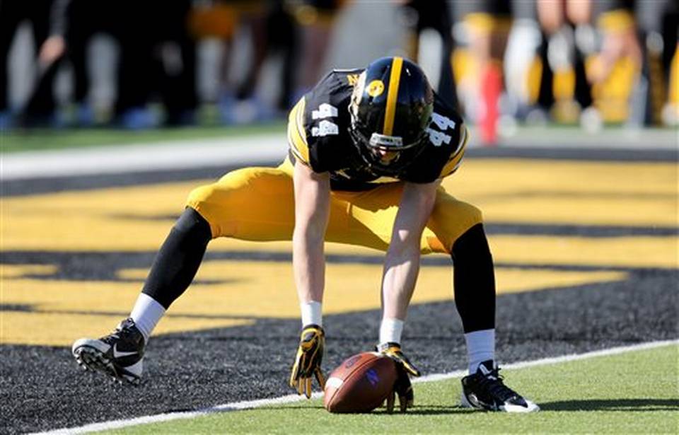 Iowa's Ben Niemann falls on a punt in the end zone Saturday against Northwestern with no Wildcats in sight. Everything was pretty much this easy for the Hawkeyes, who rolled past Northwestern. Photo credit: Justin Hayworth, AP.
